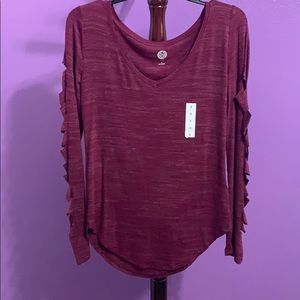 A long sleeve shirt. *NEVER BEEN WORN*